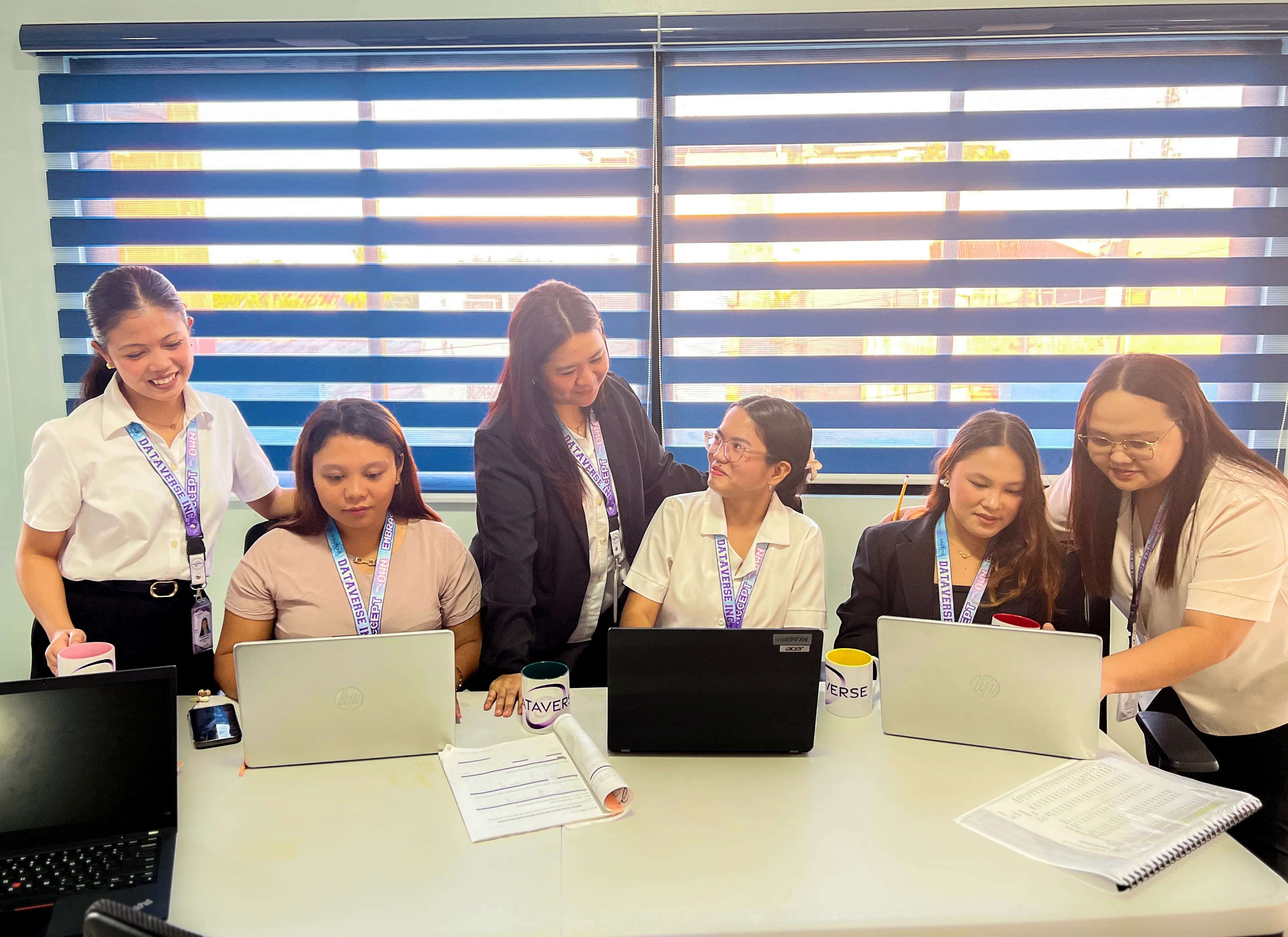 Back office team working at computers